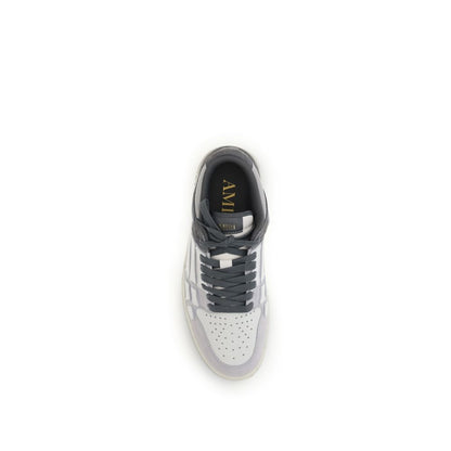Top view of Amiri Gray Calf Leather Bos Taurus Low Top Sneakers with bone-shaped appliqués and two-tone rubber sole.