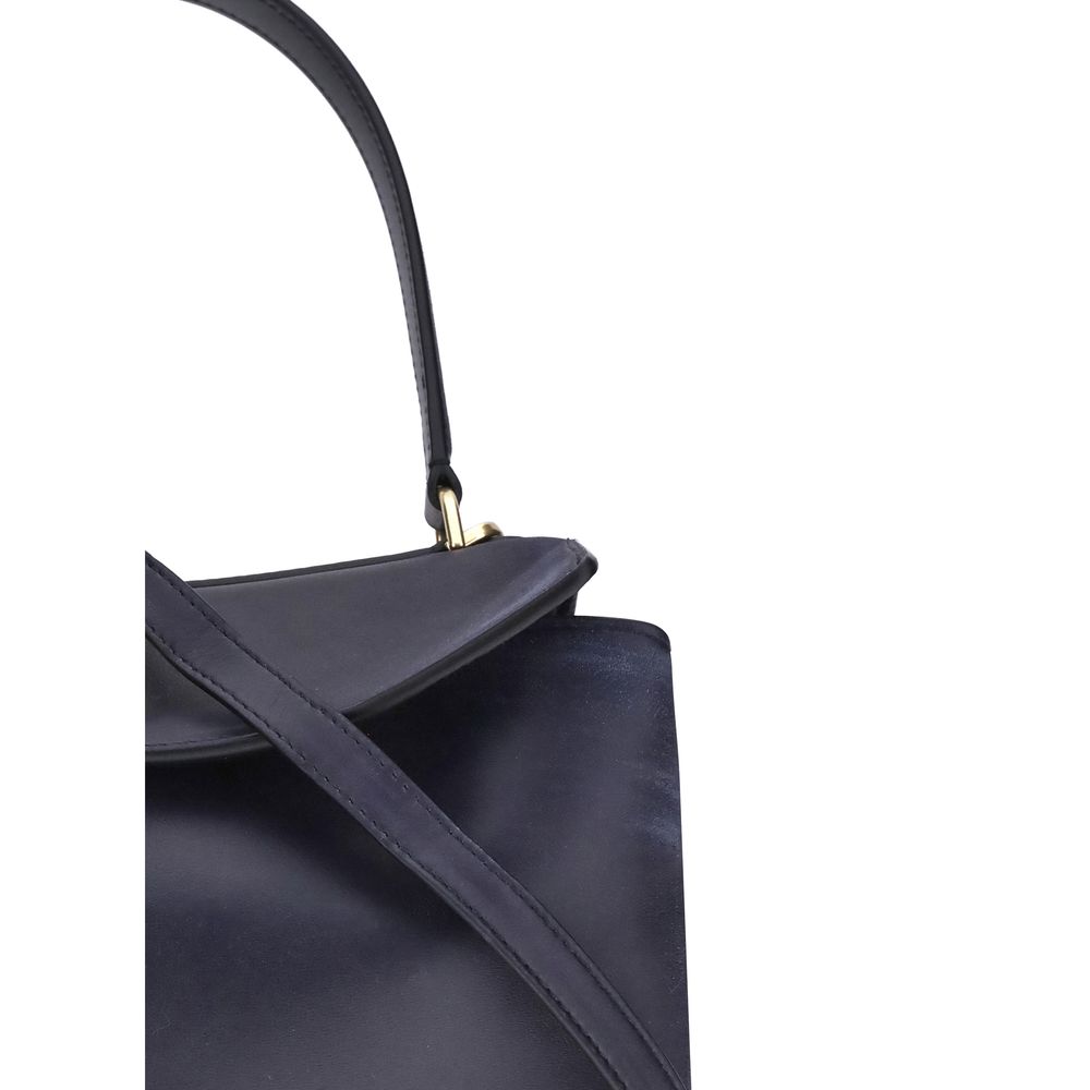 Close-up of Balenciaga Rodeo Small Shoulder Bag in used-effect leather highlighting the top handle and flap closure.
