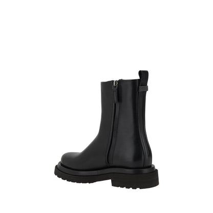 Brunello Cucinelli Black Calf Leather Bos Taurus Ankle Boots with block heel and side zipper for a sleek, comfortable fit