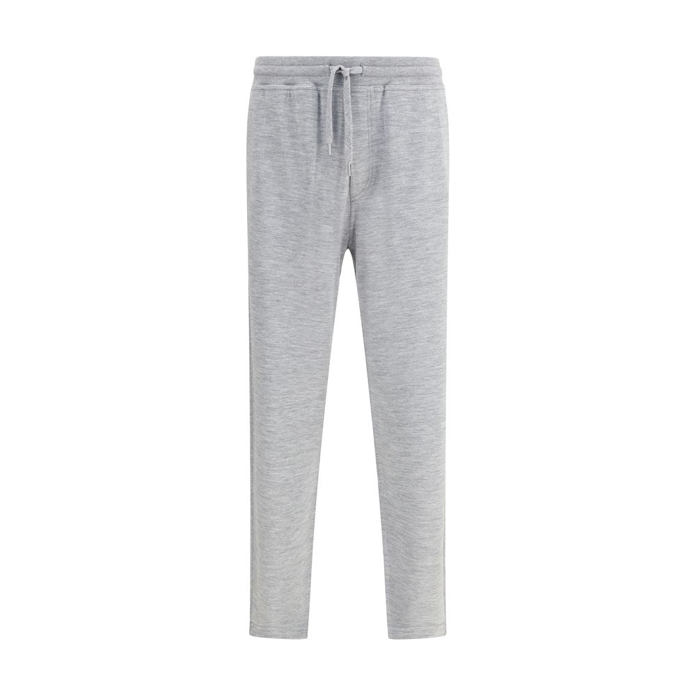 Brunello Cucinelli Cashmere Sweatpants in gray with adjustable drawstring waistband, side welt pockets, and back slit pockets.