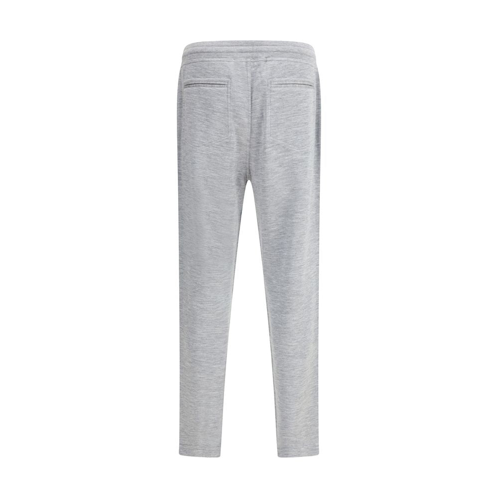 Back view of Brunello Cucinelli Cashmere Sweatpants in gray, showcasing slit pockets and stitching details for an elegant look.
