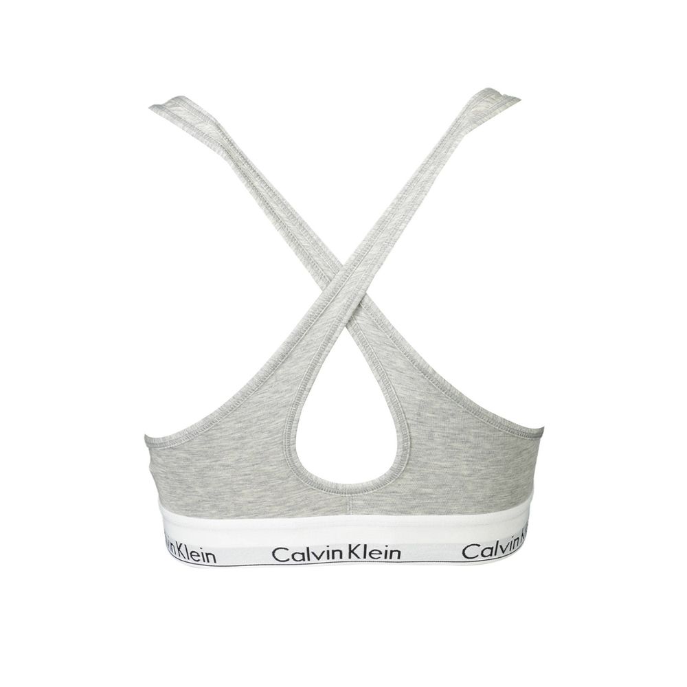 Calvin Klein Brown Cotton Women Bralette with crossed straps and elastic band showcasing chic and supportive design.