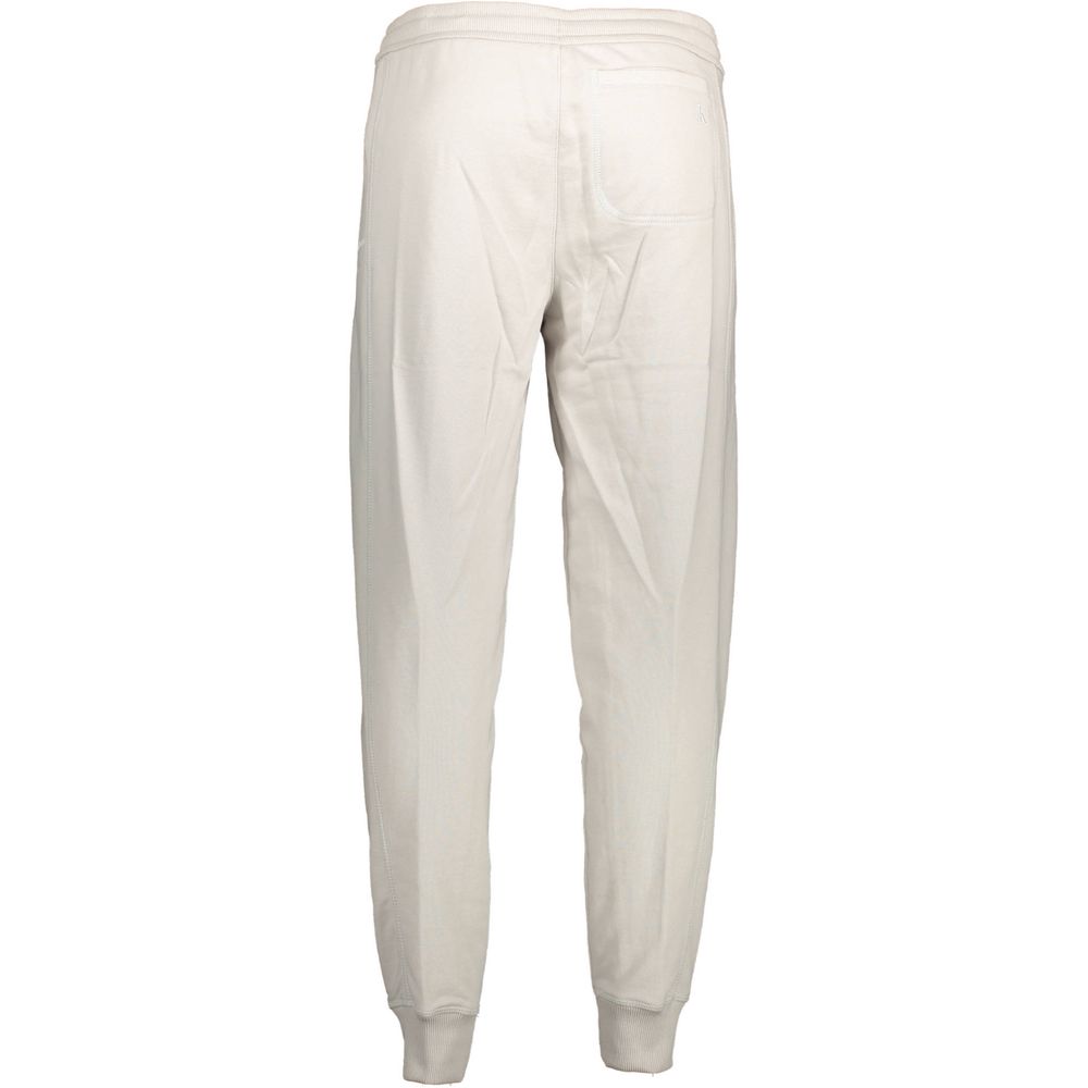 Calvin Klein Gray Cotton Pant with elastic waist, 3 pockets, and logo print, ideal sports trousers with laces