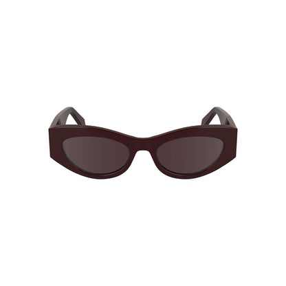 Calvin Klein Red Acetate Women Sunglasses with bold cat eye design and warm brown lenses.