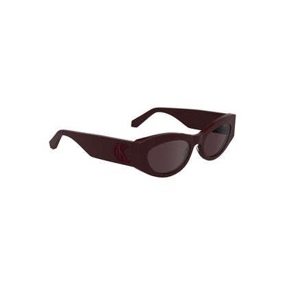 Calvin Klein Red Acetate Women Sunglasses with cat eye frame and brown lenses, perfect for a chic and bold fashion statement.