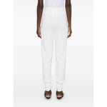 Back view of Chloé Chloè Trousers White, featuring high-waisted ribbed waistband and tapered legs, modeled in cream white knitted wool.