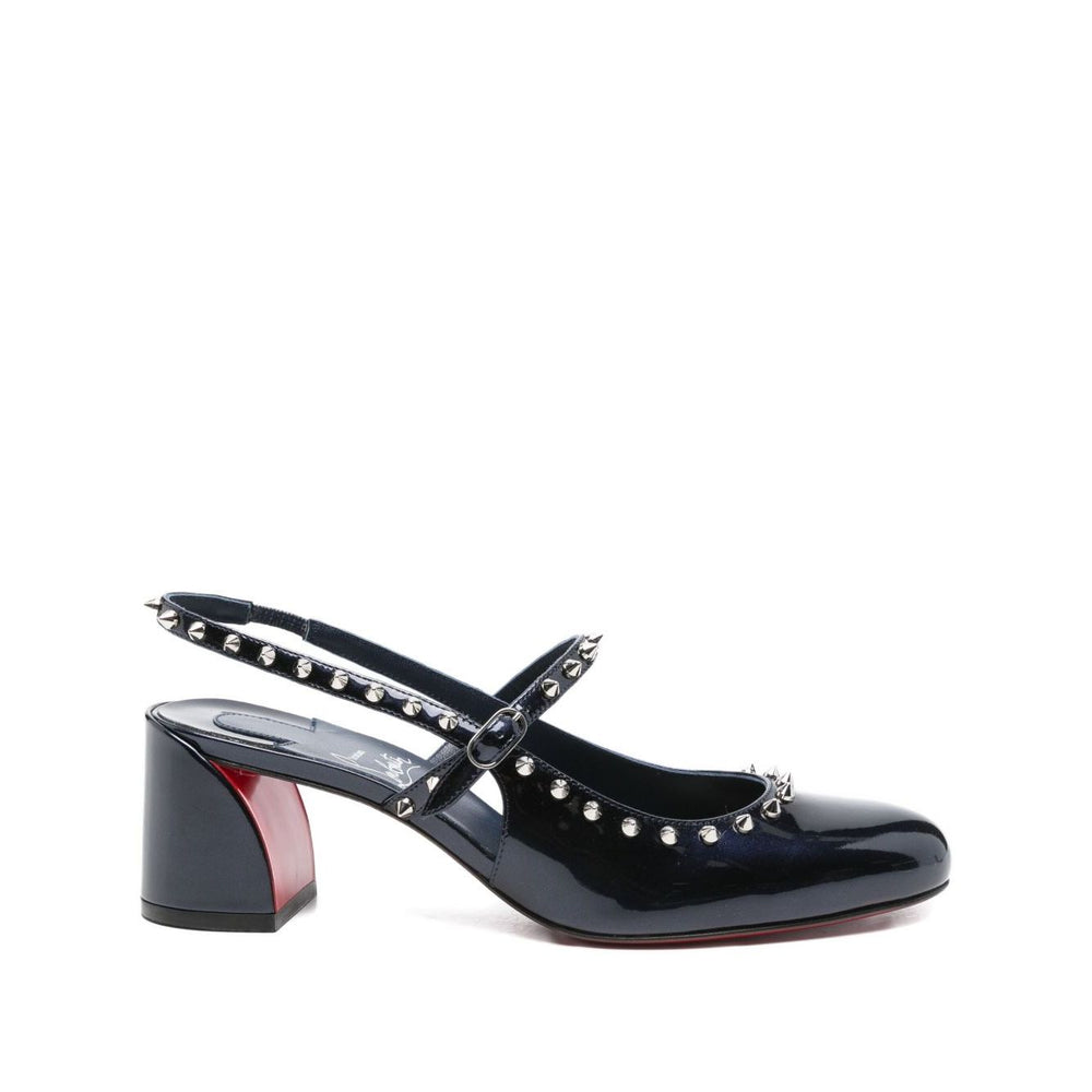 Dark blue Christian Louboutin Janispikes pumps with studded embellishments and a 6 cm block heel.