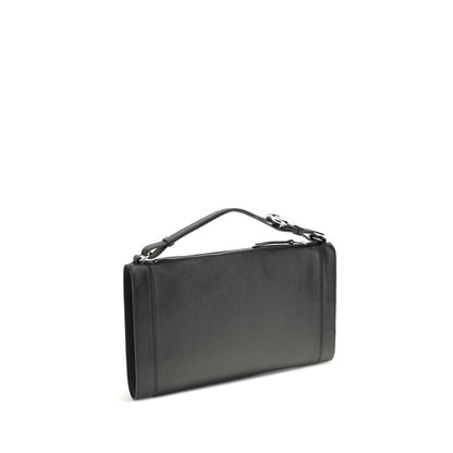 Coccinelle Black Calf Leather Bos Taurus Handbag with adjustable handle and grained leather trim, featuring top zipper closure and silver logo.