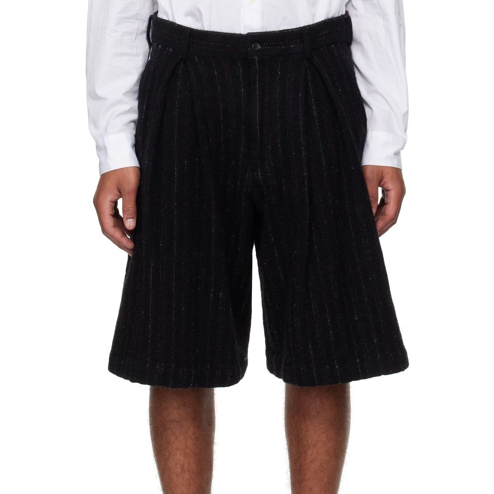 Comme Des Garçons Homme Plus Wool Shorts featuring a brushed wool-blend serge design with side pockets and belt loops, unlined.