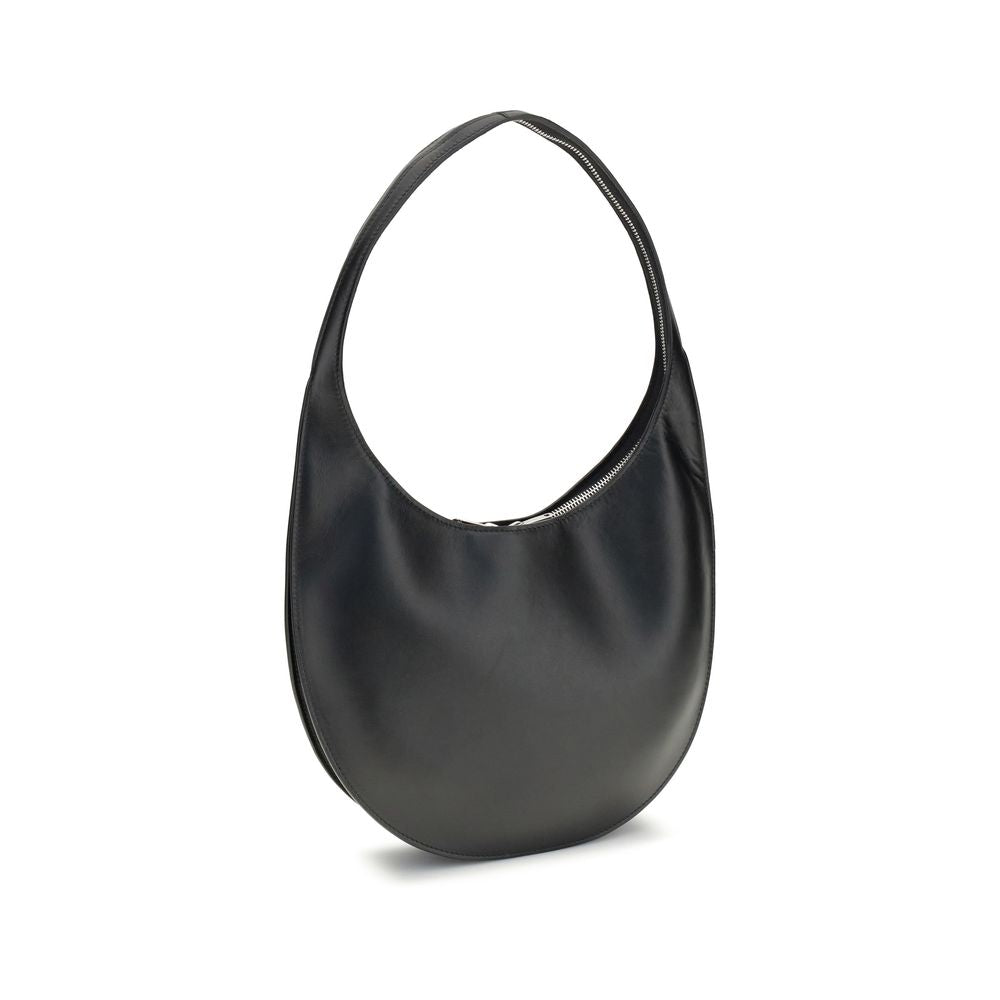 Coperni Black Leather Shoulder Bag with hobo silhouette and two-way zip closure, featuring a sleek design with a contrasting logo, AW25 collection.