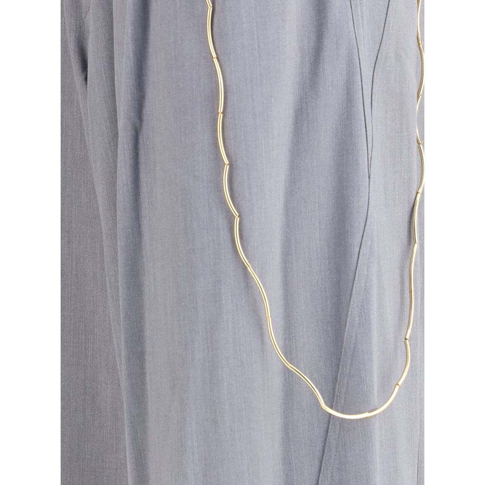 Close-up of Darkpark Gray Polyester Casual Pants with gold chain detail and front pleats, showcasing elegant design for AW25 season.