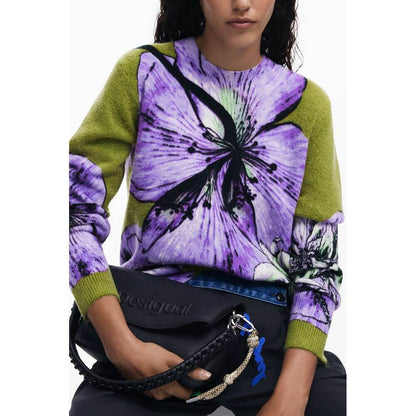 Woman wearing Desigual Purple Elastane Women Sweater with purple floral design, holding a Desigual handbag, showcasing high-fashion style.