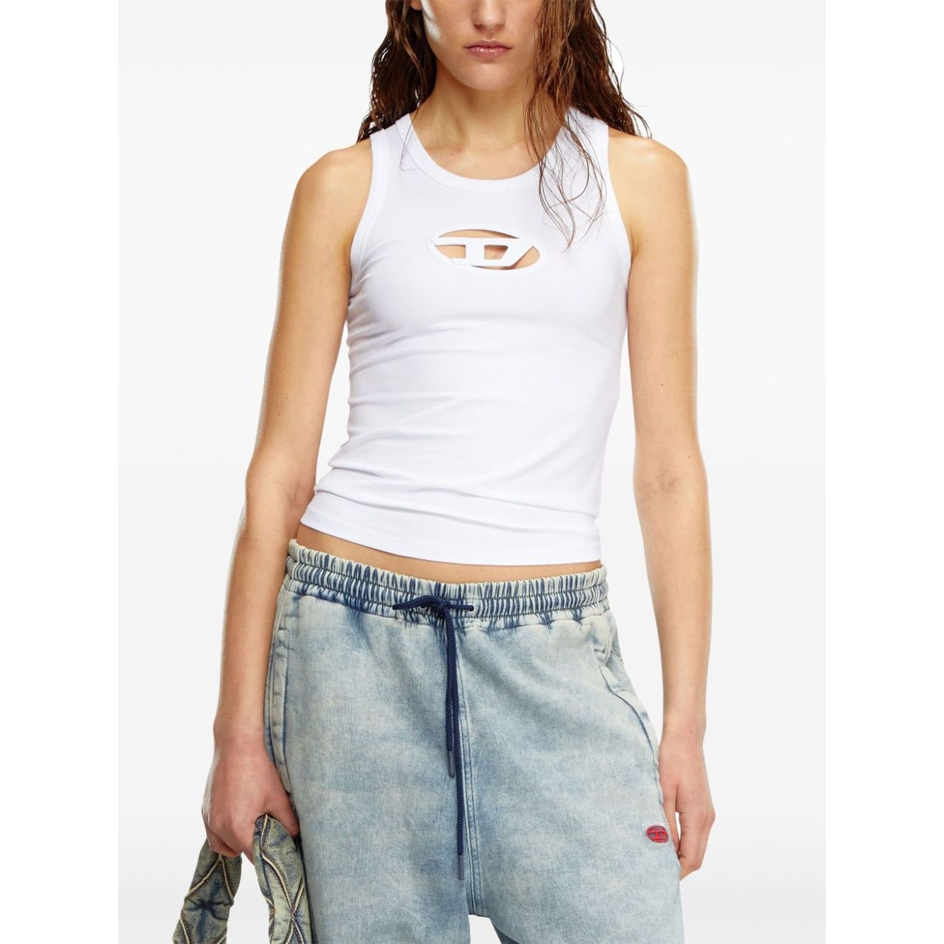Diesel Top White sleeveless organic cotton jersey with Oval D logo, crew neck design, worn by model in casual pose.