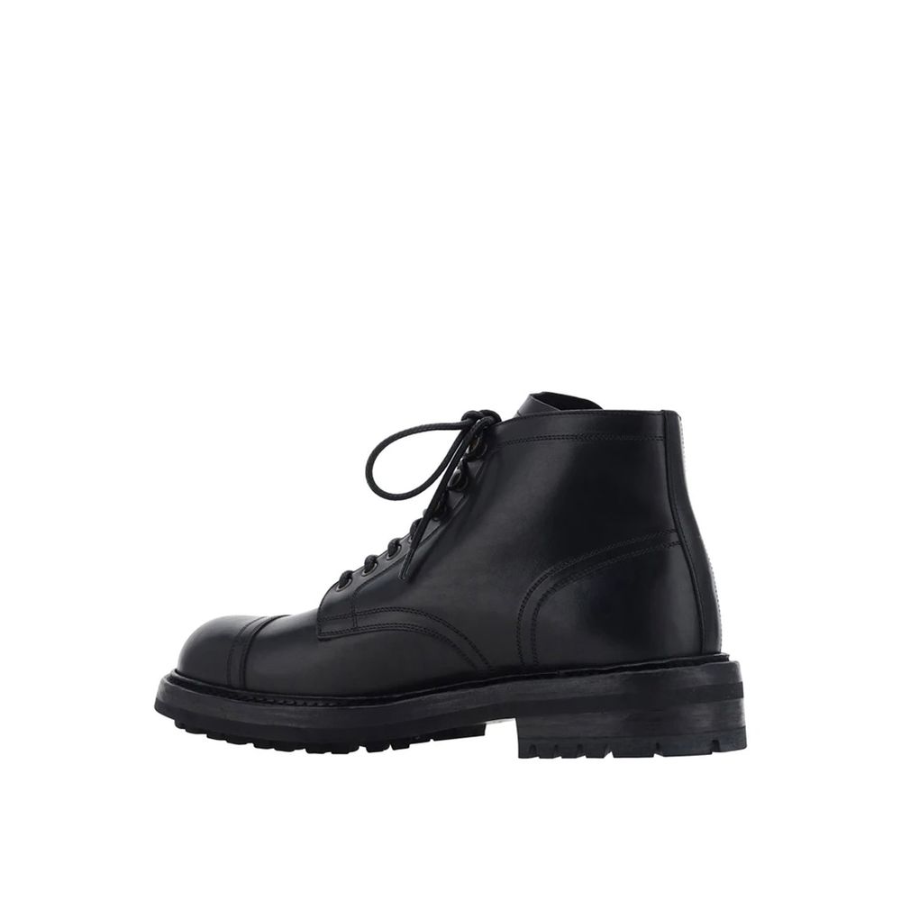 Dolce & Gabbana Black Calfskin Lace-Up Boots for men, featuring round toe and leather sole, made in Italy.