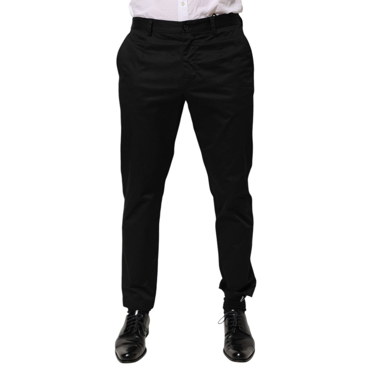 Model wearing Dolce & Gabbana Black Cotton Tapered Men Formal Trousers Pants, showcasing sleek design and elegant fit.