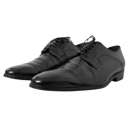 Dolce & Gabbana Black Polished Leather Formal Dress Shoes with logo details, showcasing high craftsmanship and slight wear on black leather.