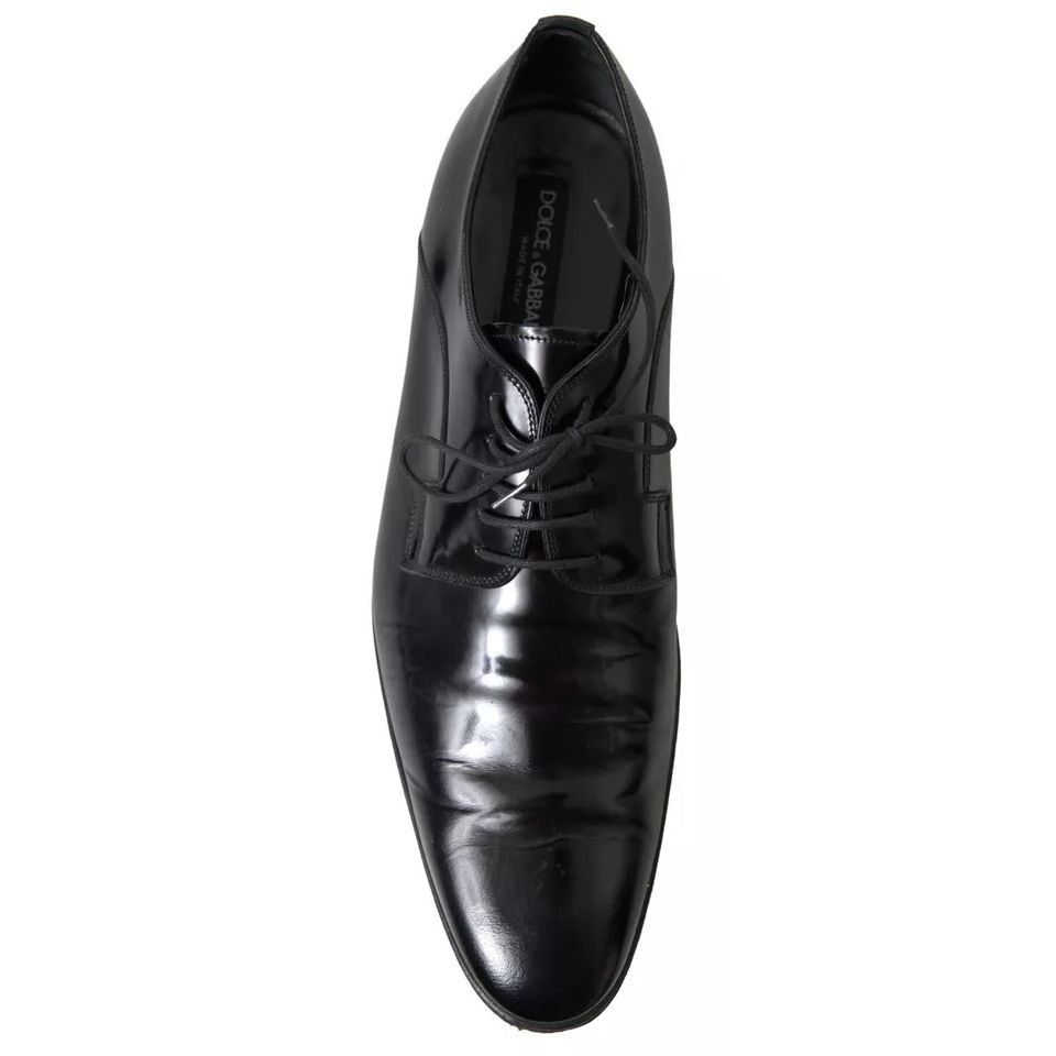 Dolce & Gabbana Black Polished Leather Formal Dress Shoes with logo details, made in Italy, slightly preowned with minor wear.