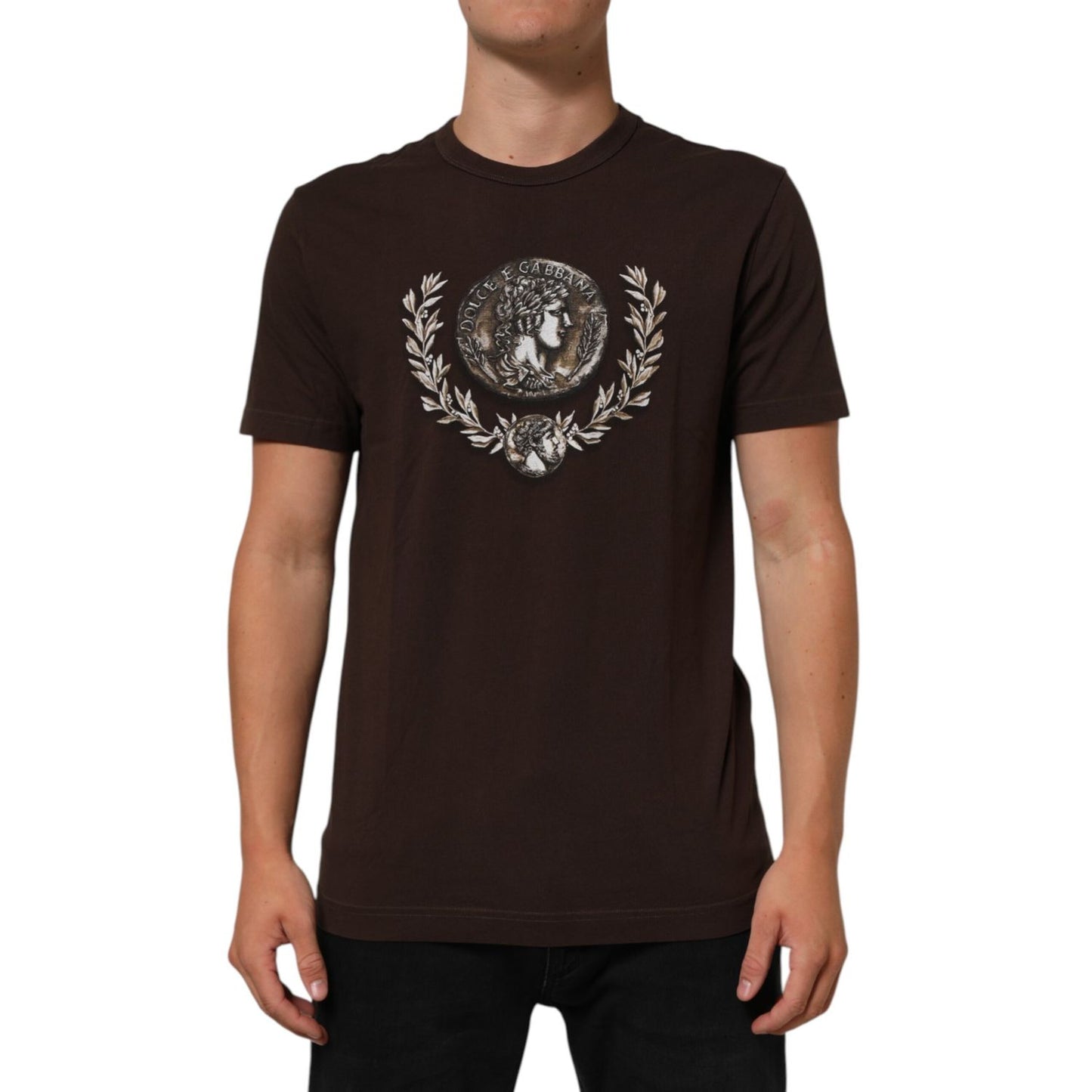Dolce & Gabbana Brown Coin Laurel Print Men Crew Neck T-shirt on model, featuring short sleeves and intricate regal design, premium cotton.