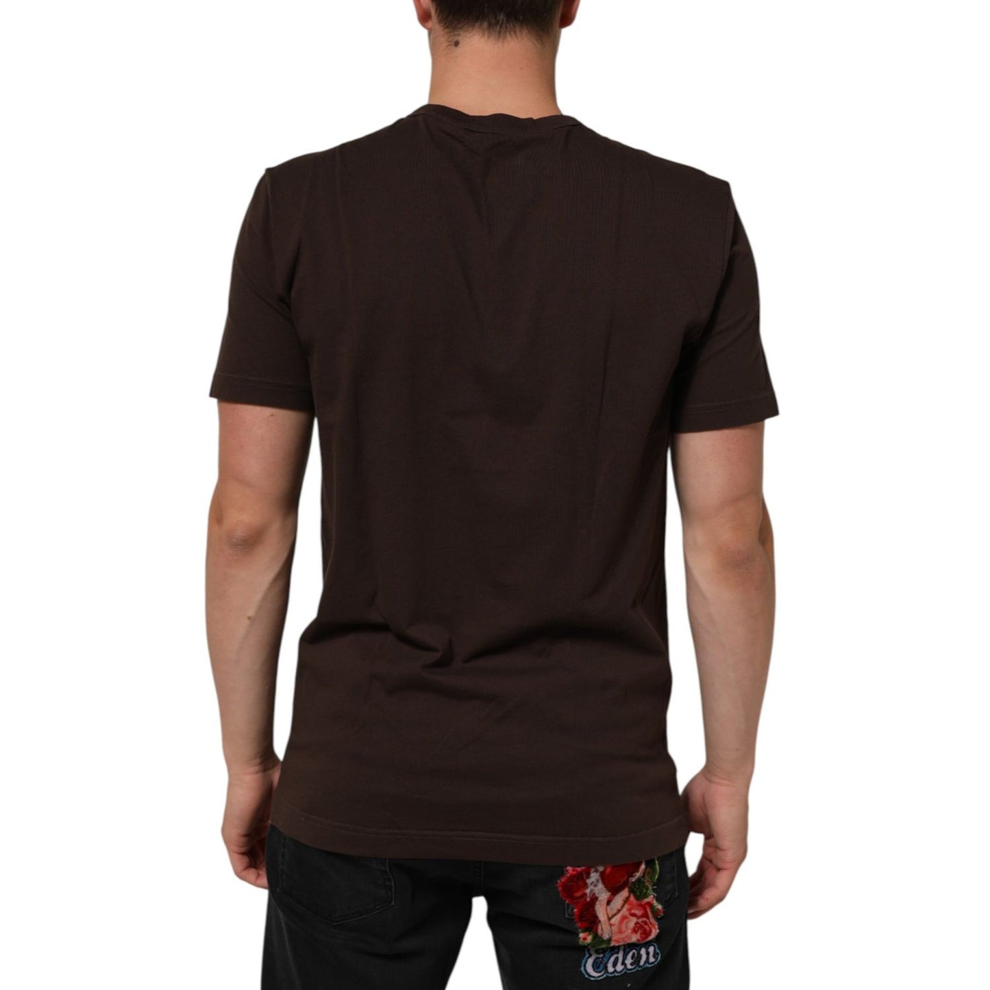Back view of Dolce & Gabbana Brown Coin Laurel Print Men Crew Neck T-shirt in premium cotton with logo details, worn by male model.