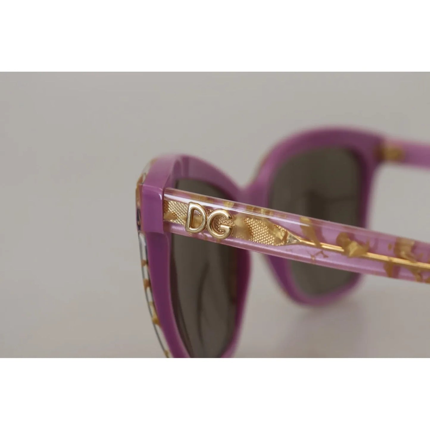 Close-up of Dolce & Gabbana DG4251 Violet Full Rim Rectangle Frame Shades Sunglasses side arm with DG logo detail and gradient lenses.