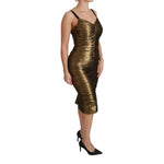 Dolce & Gabbana Gold Metallic Stretch Bodycon Ruched Dress with minor fabric pulls, side view of model wearing the dress.