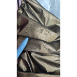 Close-up of fabric pulls on Dolce & Gabbana Gold Metallic Stretch Bodycon Ruched Dress showing minor defect.