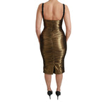 Back view of Dolce & Gabbana Gold Metallic Stretch Bodycon Ruched Dress with black straps, showing ruched detailing and zipper closure.