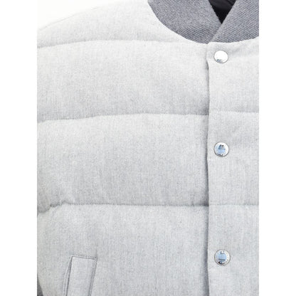 Close-up of Dolce & Gabbana Gray Cotton Bomber showing snap buttons and ribbed details, reversible design for style versatility.