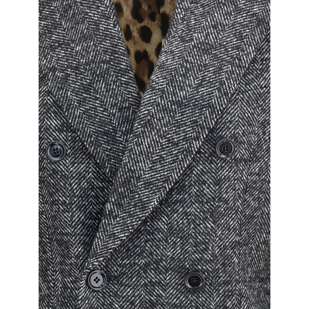 Dolce & Gabbana Gray Fleece Wool Blazer with peaked lapels and double-breasted design, showcasing textured chevron pattern. AW25.