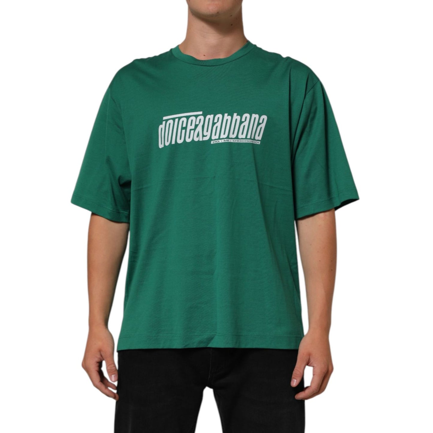 Man wearing Dolce & Gabbana Green Cotton Graphic Logo Print Crewneck T-shirt with bold logo, short sleeves, and a classic crew neck.