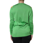 Back view of Dolce & Gabbana Green Lemon Print Pullover Silk Women Sweater showcasing elegant green silk design.