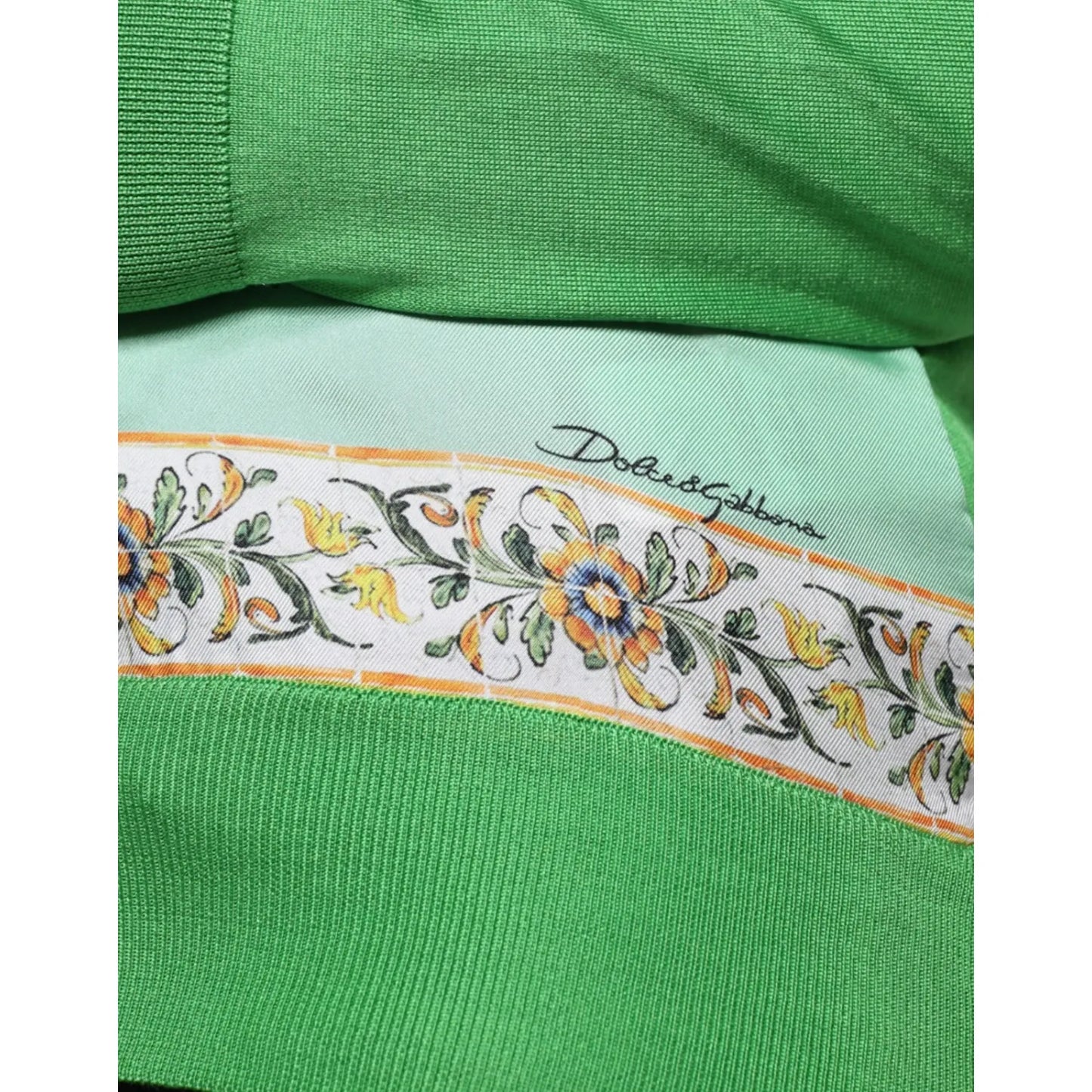 Close-up of Dolce & Gabbana Green Lemon Print Pullover Silk Women Sweater showcasing floral and lemon details.