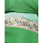 Close-up of Dolce & Gabbana Green Lemon Print Pullover Silk Women Sweater showcasing floral and lemon details.