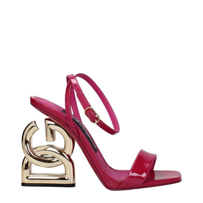 Dolce & Gabbana Pink Leather Stiletto Heel Sandals with gold accents, open toe design, buckle closure, and side logo.