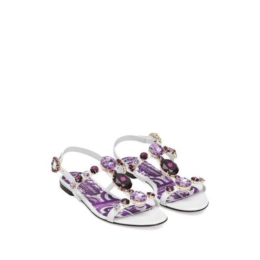 Dolce & Gabbana Sandals Purple with rhinestone embellishments, side buckle, flat sole, and Maiolica leather.