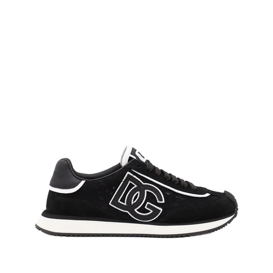 Dolce & Gabbana Sneakers Black with rubber sole, branded heel counter, and logo patch on tongue. Black lace-up DG Cushion sneakers.
