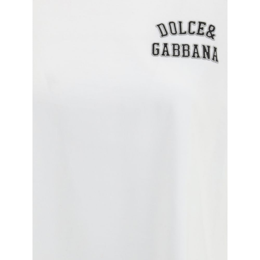 Dolce & Gabbana White Cotton T-Shirt with logo patch on chest; ribbed crew neck; 100% cotton; ideal for casual fashion, regular fit.