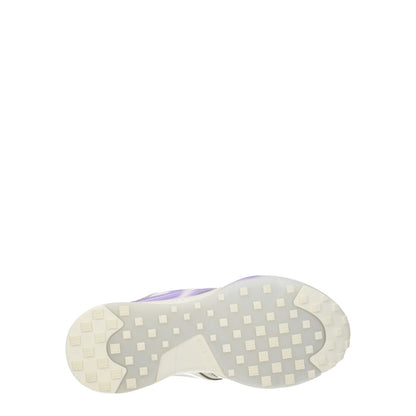 Sole view of Givenchy Beige Leather Low Top Sneakers with rubber outsole and lilac accents.