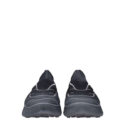 Front view of Givenchy Gray Fabric Athletic Sneakers with rubber sole and side logo, featuring mid heels and round toe design.