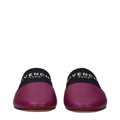 Givenchy Purple Leather Slippers with front logo, round toe, low flat heel, dark orchid hue, made from high-quality leather.