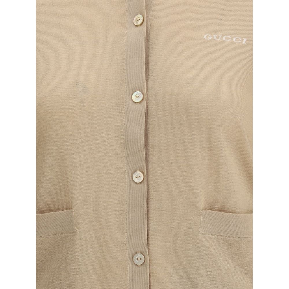Gucci Cashmere Cardigan featuring front button closure and patch pockets - elegant AW25 design.