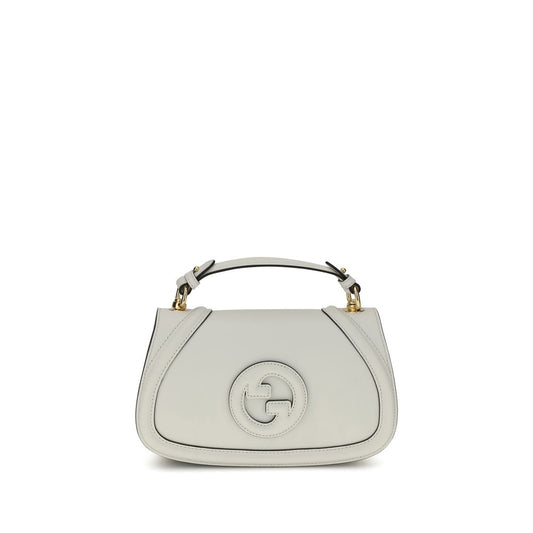 Gucci White Calf Leather Bos Taurus Handbag with tonal GG applique and removable strap, featuring a hidden magnetic closure and back slit pocket.