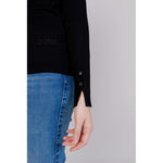 Woman wearing Guess Black Cotton Sportswear featuring a black jersey from the Fall/Winter collection made of 100% cotton.