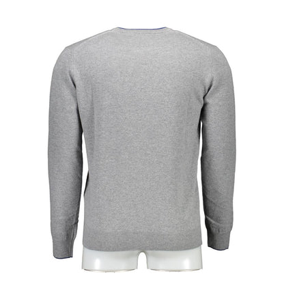 Back view of gray wool sweater, showcasing long sleeves and crew neck design for stylish men.