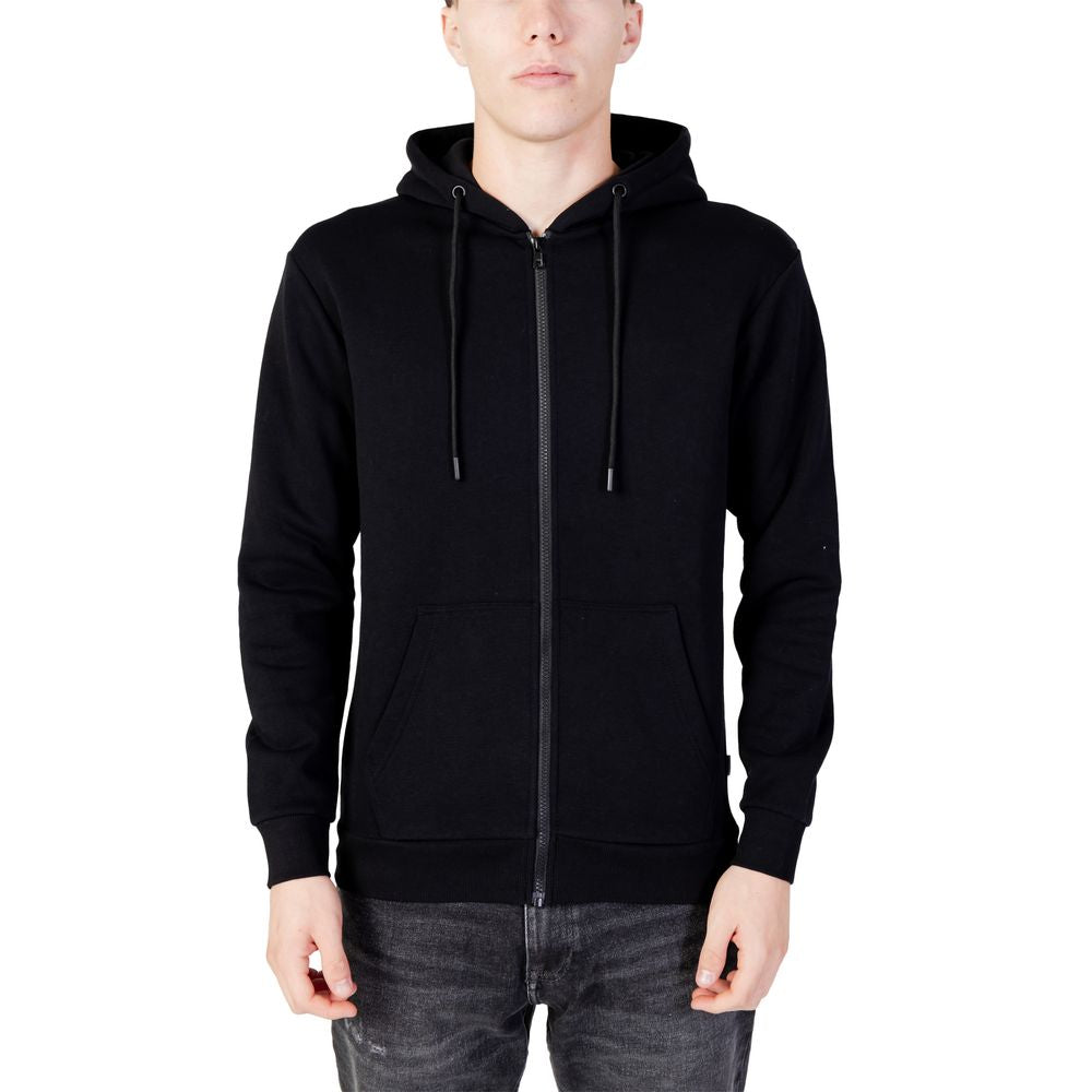 Male model wearing Jack Jones Black Polyester Hoodie with full zip front and drawstring hood, showcasing casual style and comfort.