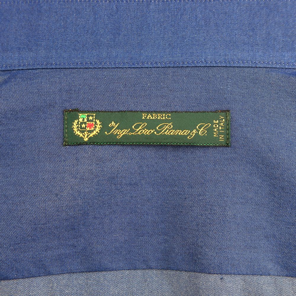 Label on Made in Italy Blue Cotton Men's Shirt by Loro Piana, showcasing quality craftsmanship and elegant design.