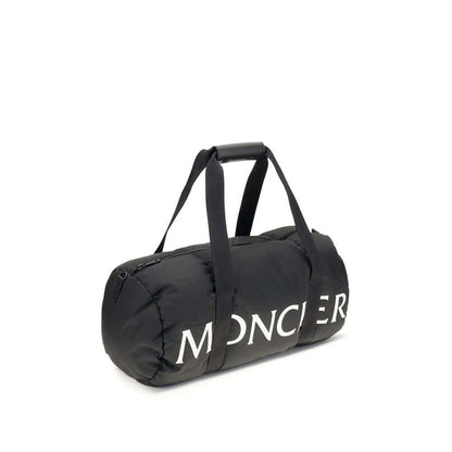 Moncler Black Nylon Luggage And Travel duffle bag with leather-tab handles and shoulder strap.