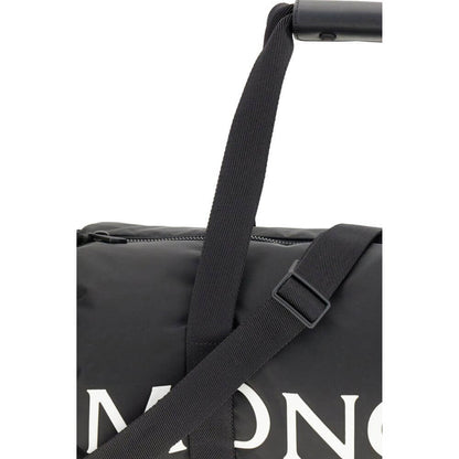 Moncler Black Nylon Luggage And Travel bag with adjustable strap and logo detail.