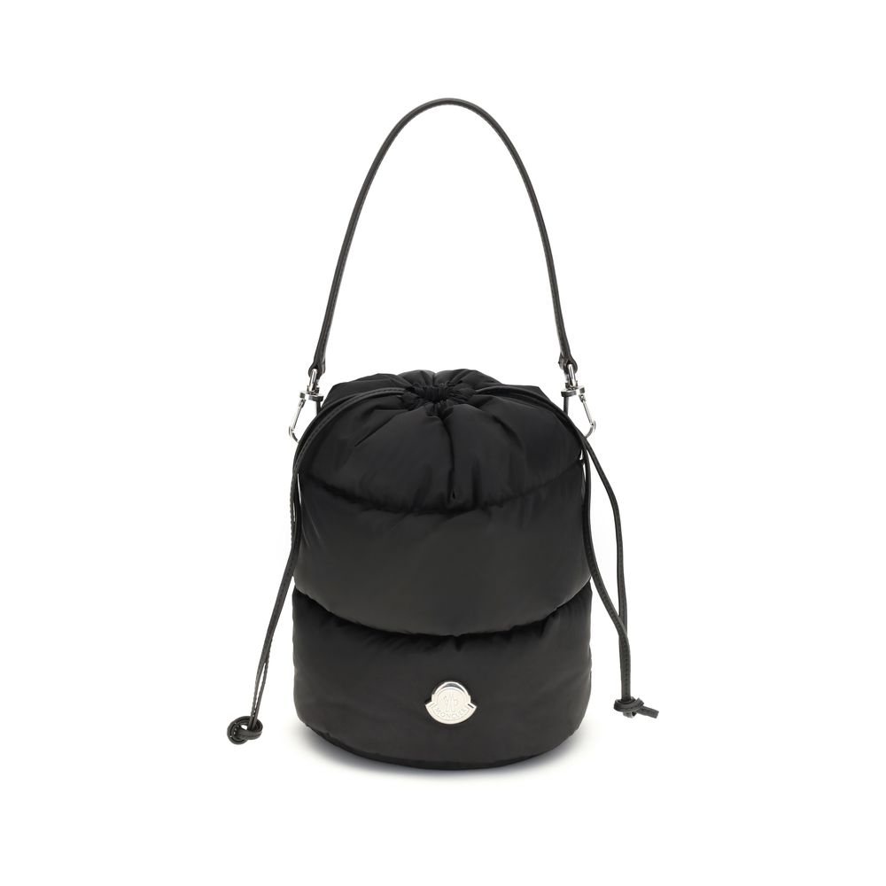 Moncler Caradoc Bucket Bag in black water-repellent nylon with adjustable leather strap and padded drawstring closure.