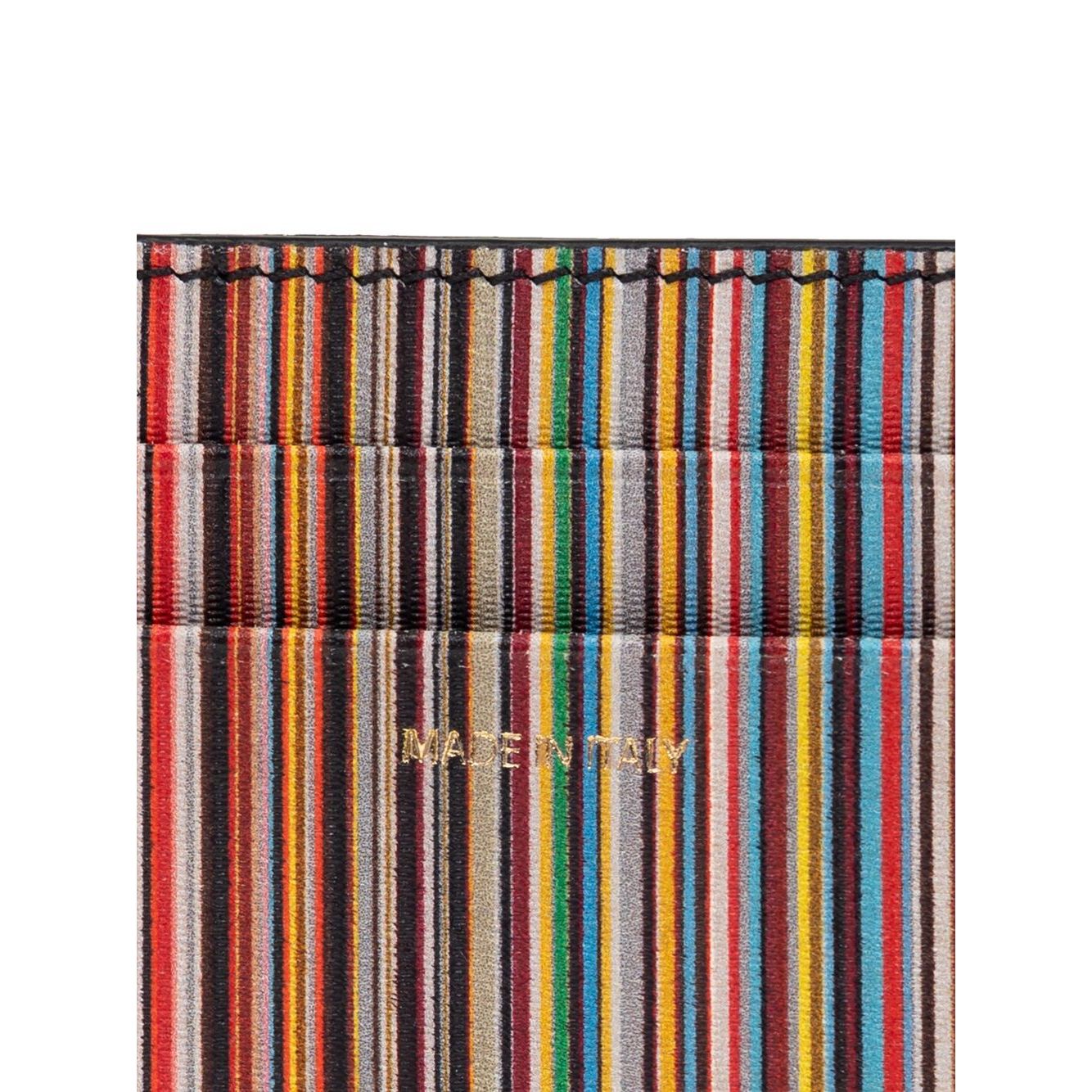 Paul Smith Signature Stripe leather card case with black card slots and logo stamp, showcasing colorful stripe design.